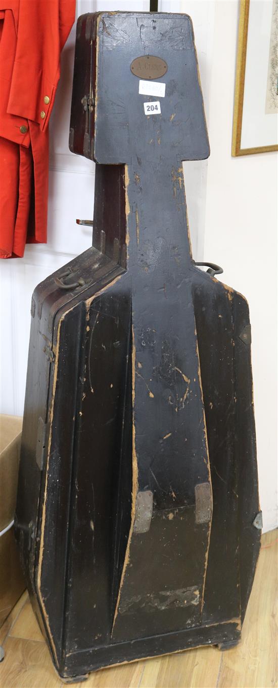 A wooden cello case height 137cm